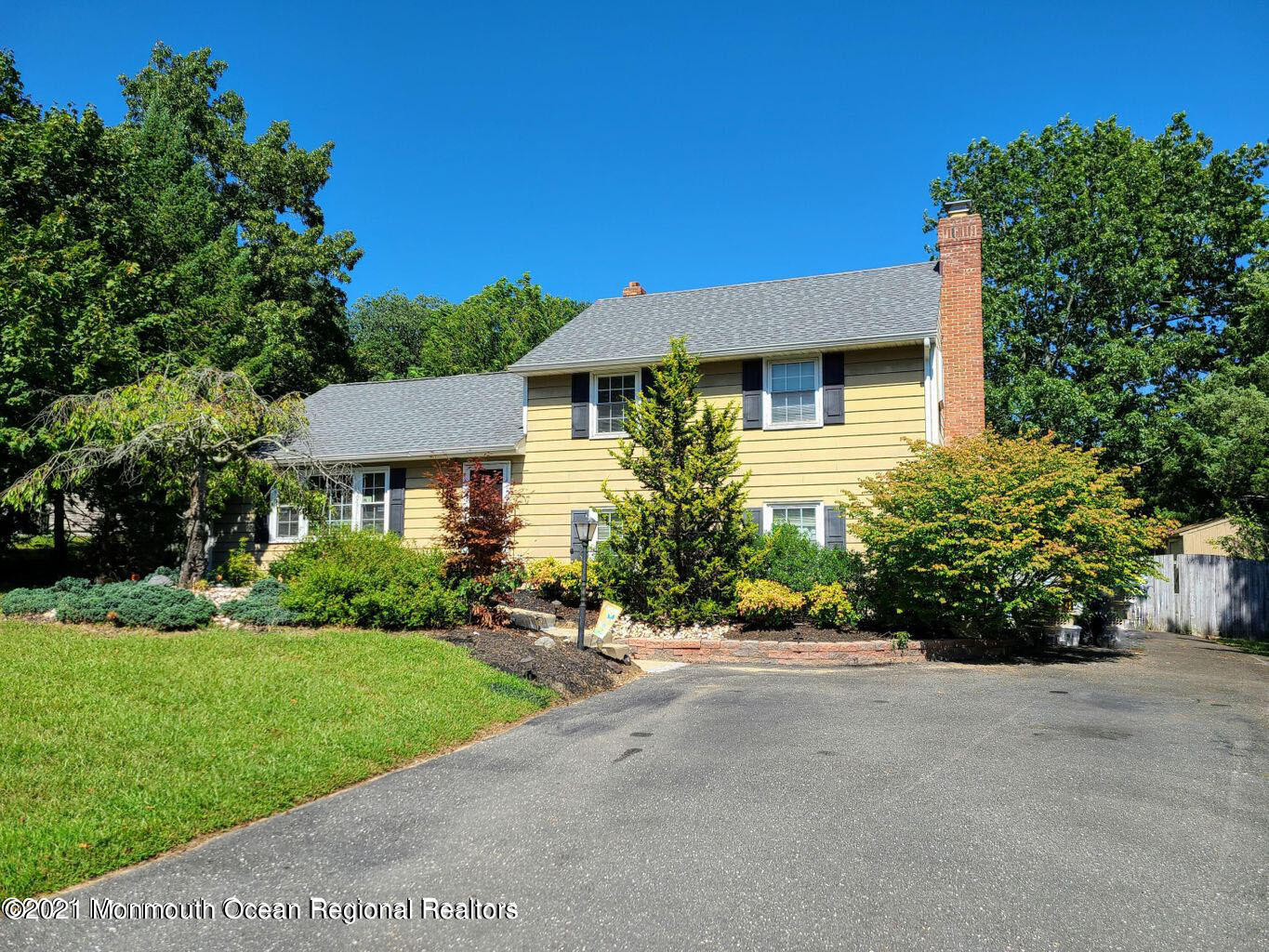 10 Buxton Road Jackson, NJ 08527 - Photo 1 of 1 a front view of a house with a yard