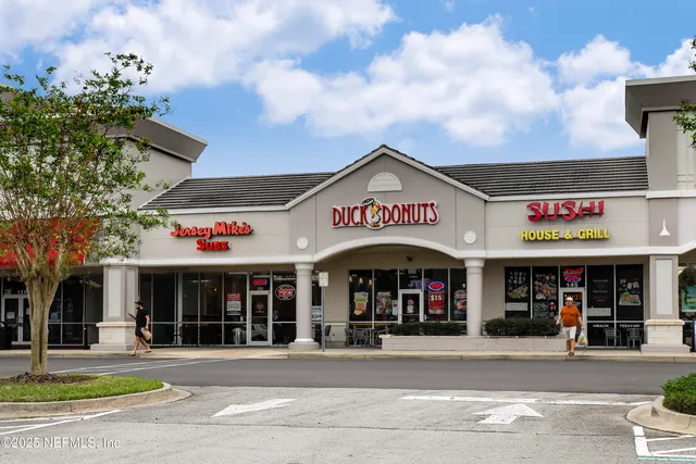 a view of street with shops
