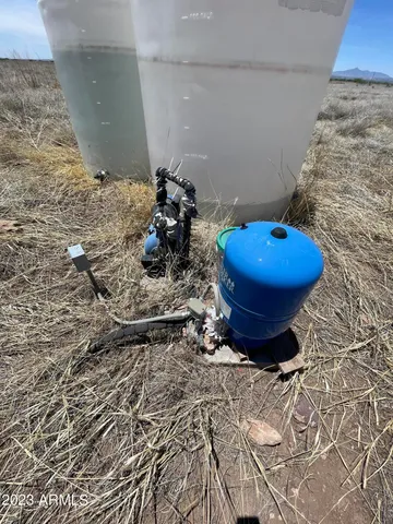 a view of a backyard of the house