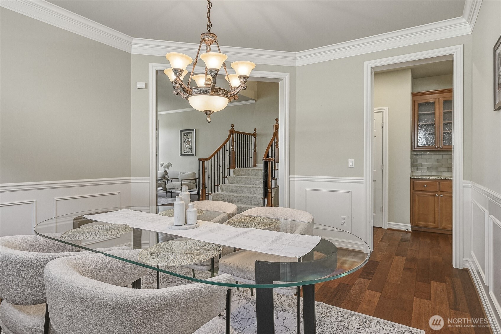 3932 221st Place Southeast Bothell, WA 98021 - Photo 11 of 36 a view of a dining room with furniture and wooden floor