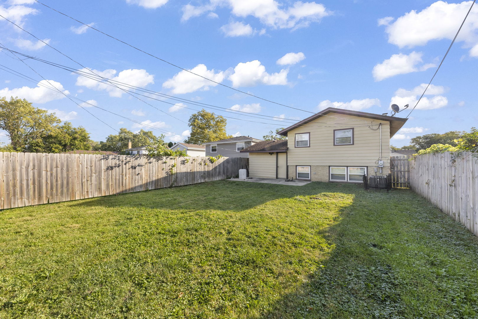 11616 South Racine Avenue Chicago, IL 60643 - Photo 13 of 13 a view of a backyard with a garden