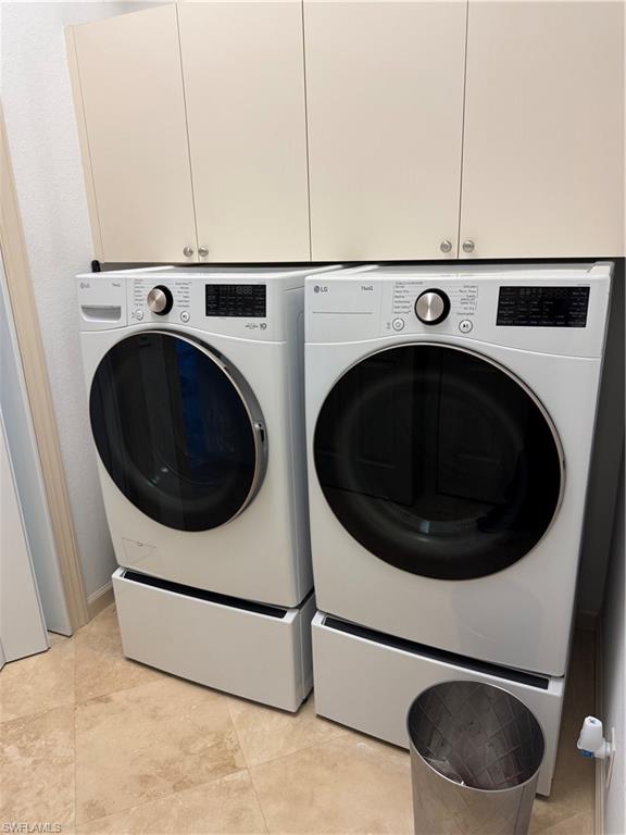 15890 Delasol Lane Naples, FL 34110 - Photo 15 of 16 a utility room with dryer and washer