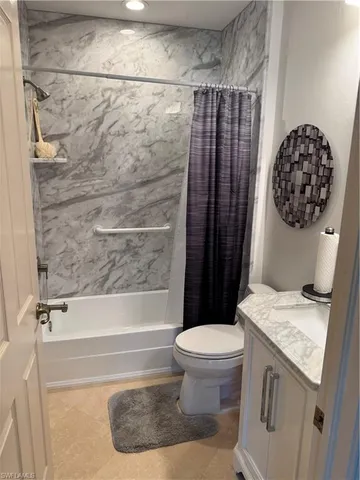 a view of kitchen with stainless steel appliances a sink a refrigerator and a stove