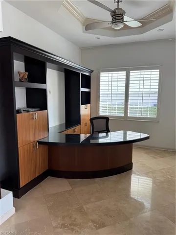 a view of living room with furniture and a fireplace