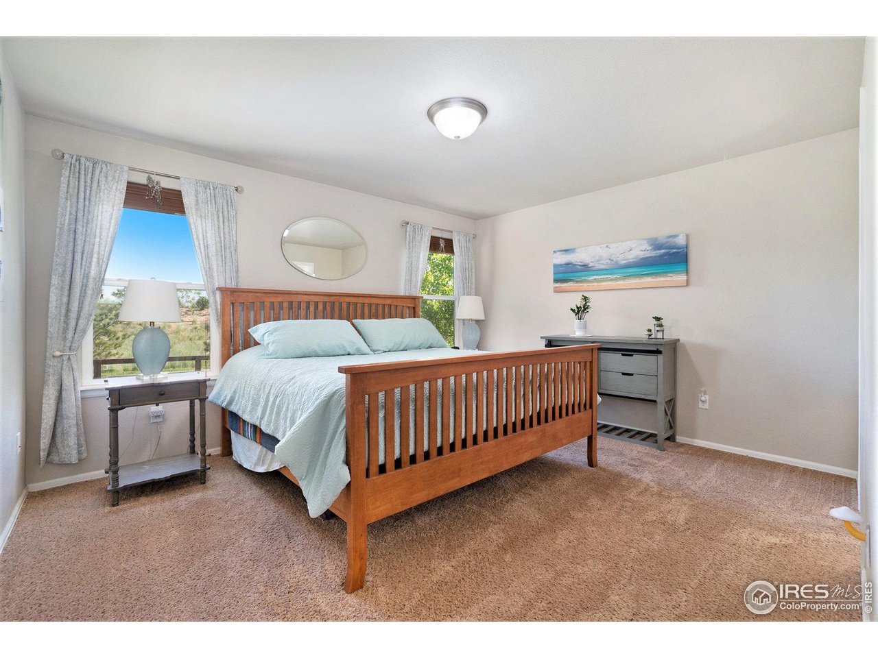 2185 Grain Bin Windsor, CO 80550 - Photo 11 of 22 a bedroom with a bed and window