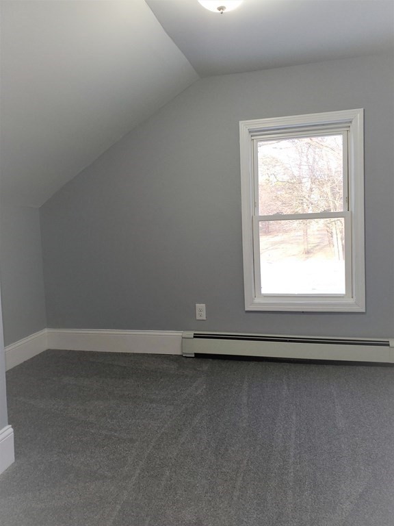 16 Court Street Lowell, MA 01852 - Photo 10 of 14 an empty room with a window
