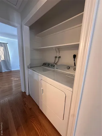 a utility room with dryer and washer