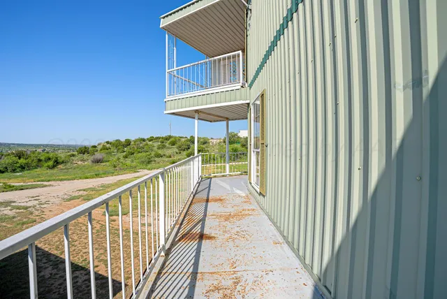 a view of balcony with staircase