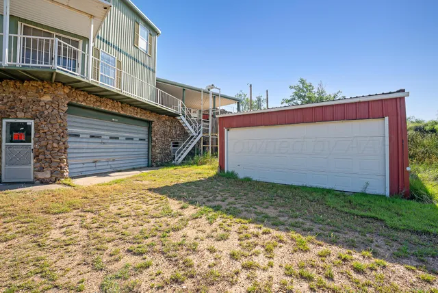 a view of a backyard of the house