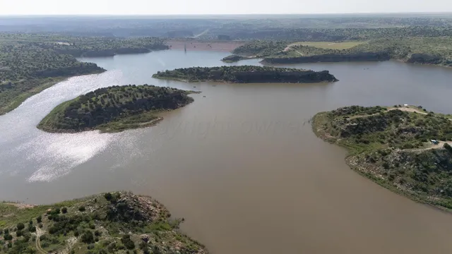 a view of lake with mountain