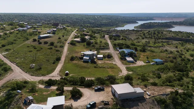 an aerial view of residential house with outdoor space
