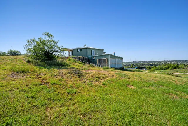 a house view with a garden space