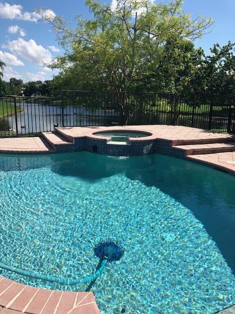 19717 Dinner Key Drive Boca Raton, FL 33498 - Photo 2 of 48 Fenced pool on water