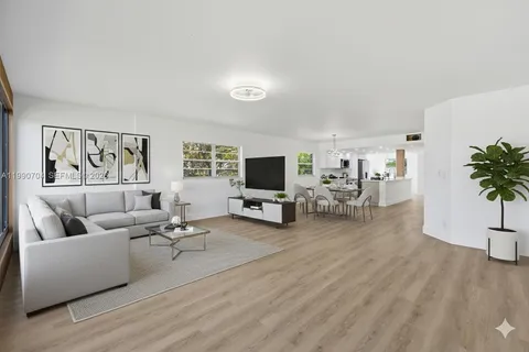 a view of a room with wooden floor