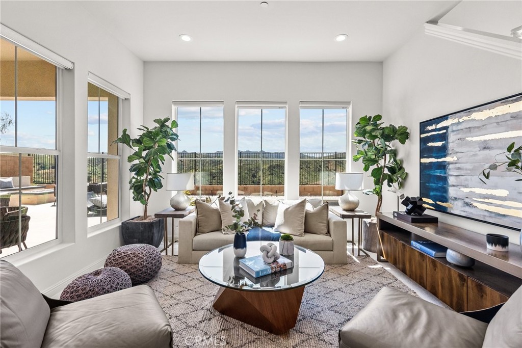 Living Room with Large Windows showcasing Unobstructed Panoramic Views