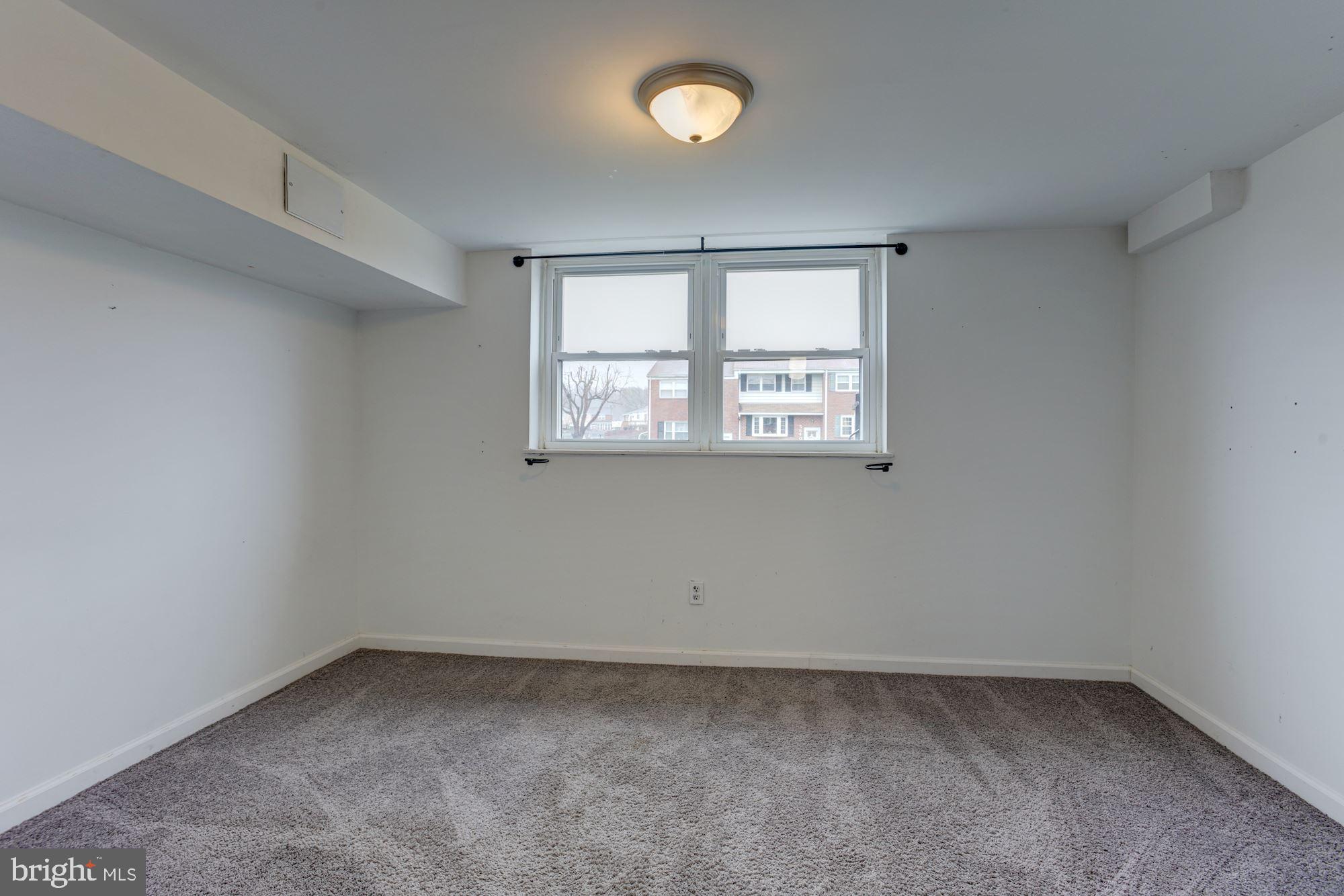 5639 Chelwynd Road Halethorpe, MD 21227 - Photo 25 of 35 Lower Level Bedroom | Bonus Room