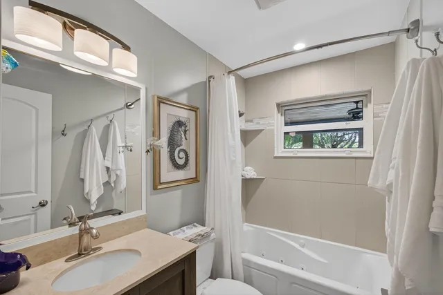 a view of a backyard with sitting area