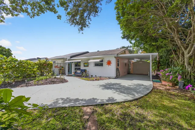 a view of a lake with a yard