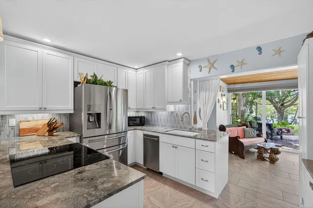 a bedroom with a bed and ceiling fan