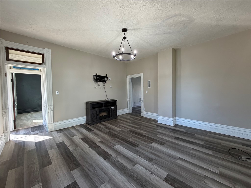 230 West Decatur Street Eaton, OH 45320 - Photo 4 of 22 This spacious room features newly installed flooring and an inviting ambiance.