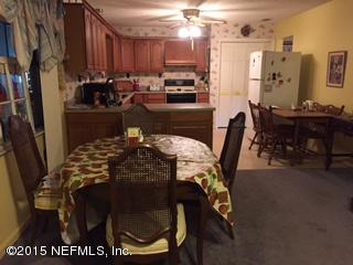 8236 Brooks Road Bryceville, FL 32009 - Photo 20 of 26 a view of a dining room with furniture