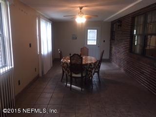 8236 Brooks Road Bryceville, FL 32009 - Photo 21 of 26 a dining room with furniture and window