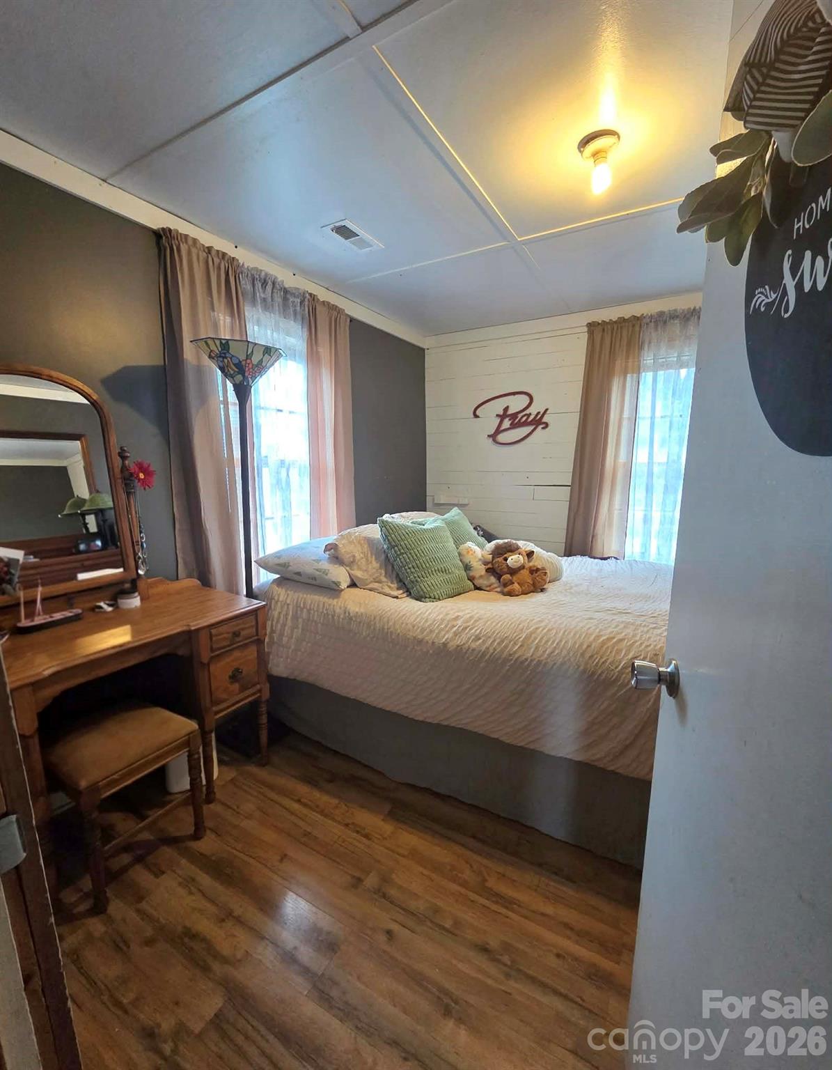 8772 Honeycutt Road Stanfield, NC 28163 - Photo 2 of 7 a bedroom with a bed and a desk