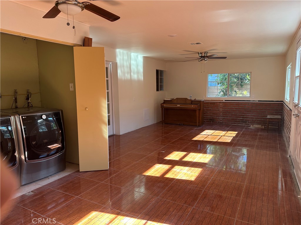 7721 Rhea Avenue Reseda, CA 91335 - Photo 5 of 16 a living room with a couch and a window