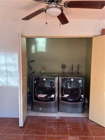 a view of a tree in front of a house