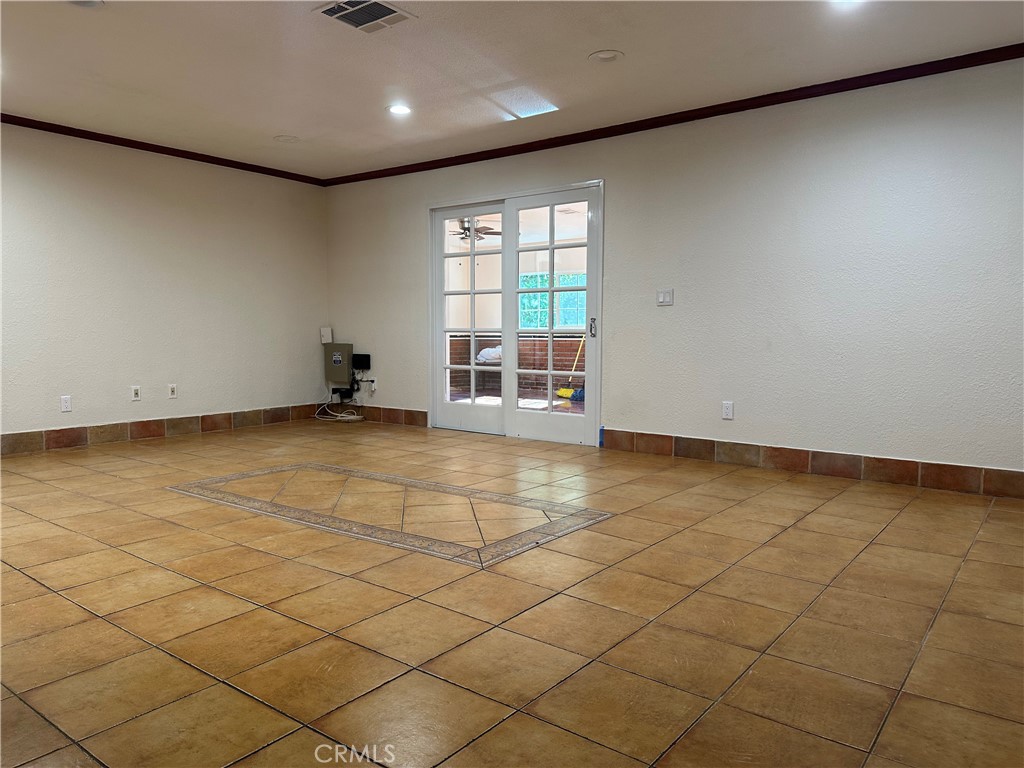 7721 Rhea Avenue Reseda, CA 91335 - Photo 9 of 16 an empty room with windows