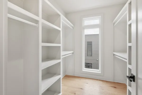 a view of an empty walk in closet