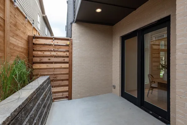 a view of outdoor space with balcony and stairs