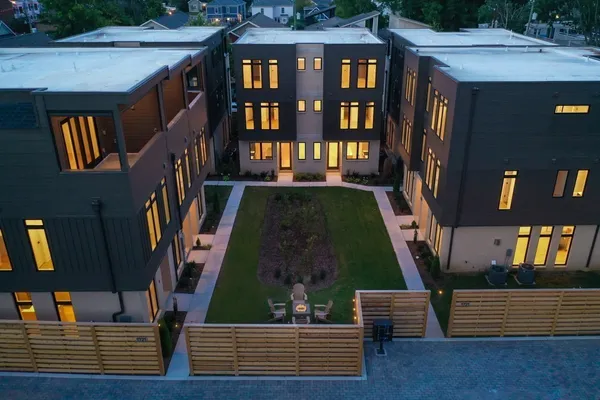 a front view of building with yard