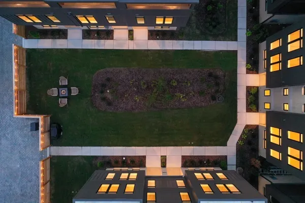 a view of patio with a table and chairs