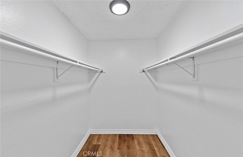 600 West 3rd Street, Unit 107 Santa Ana, CA 92701 - Photo 19 of 26 a view of room with racks on the wall