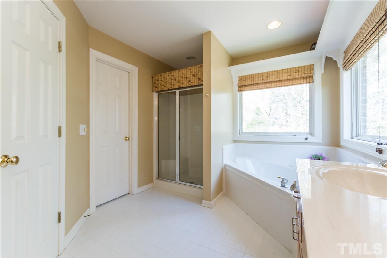 2832 Anfield Road Raleigh, NC 27606 - Photo 14 of 24 Master Bath features Separate Water Closet and Large Walk-in Closet