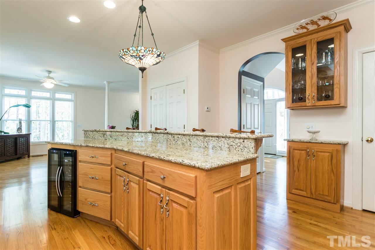 2832 Anfield Road Raleigh, NC 27606 - Photo 8 of 24 Kitchen has Granite Counter Tops and Double Door Pantry