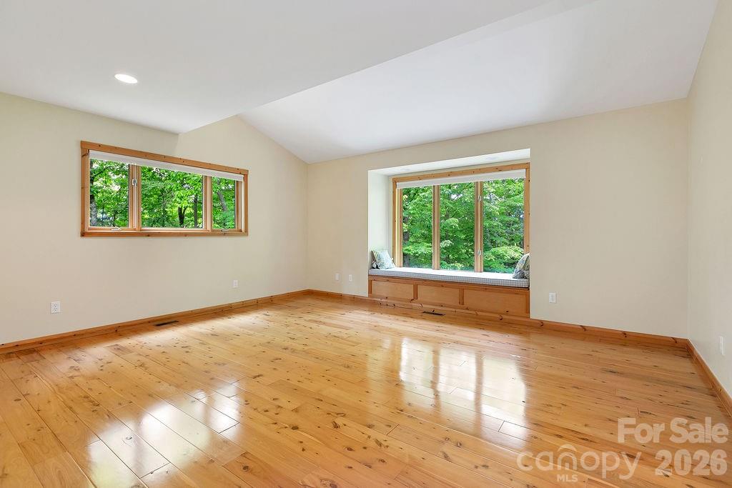 40 Walnut Ridge Road Brevard, NC 28712 - Photo 21 of 47 a view of an empty room with a window