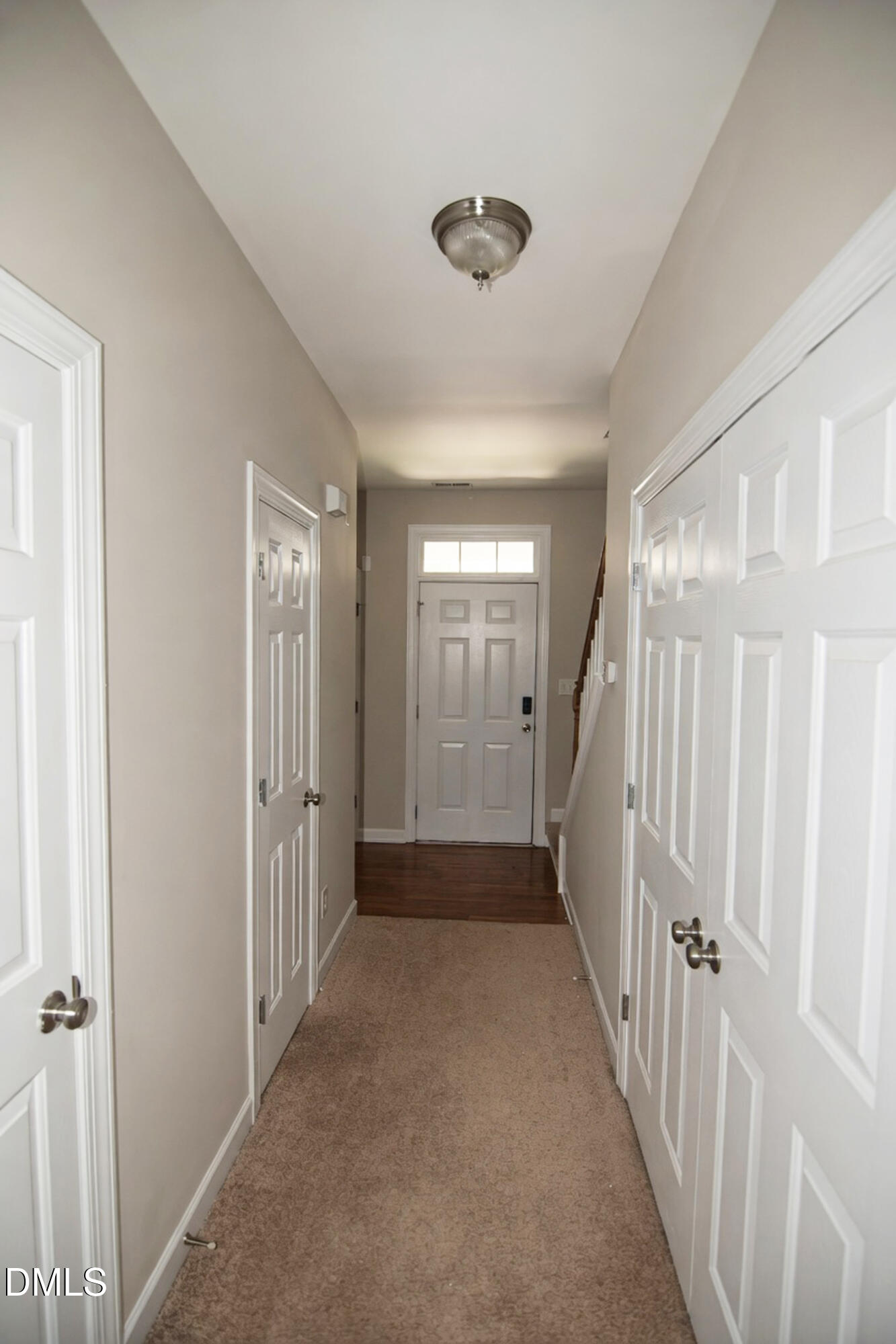 4809 Landover Pine Place Raleigh, NC 27616 - Photo 2 of 14 a view of a hallway with a window