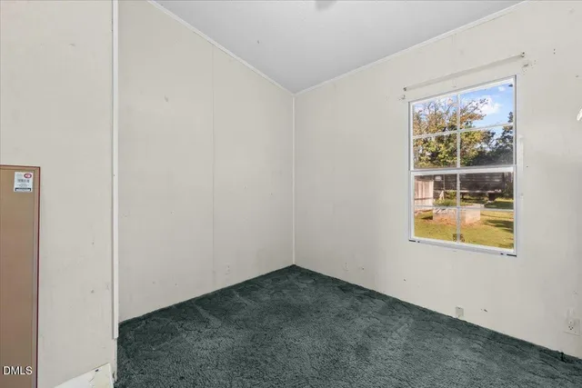 an empty room with window