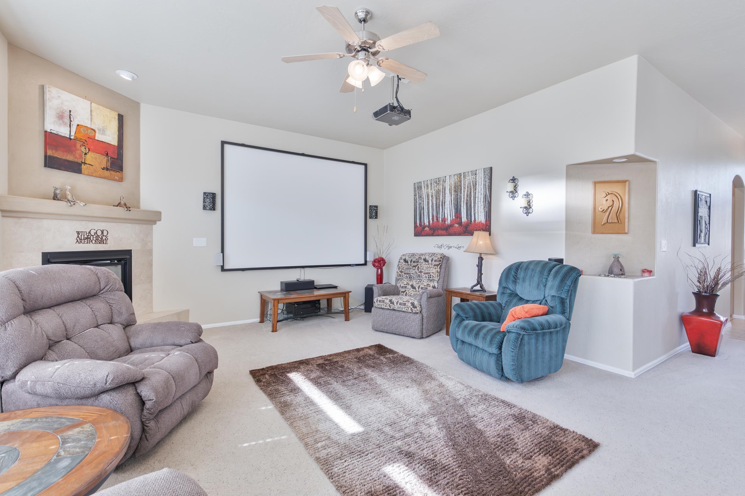 544 Hemlock Drive Fruita, CO 81521 - Photo 8 of 36 a living room with furniture and a flat screen tv