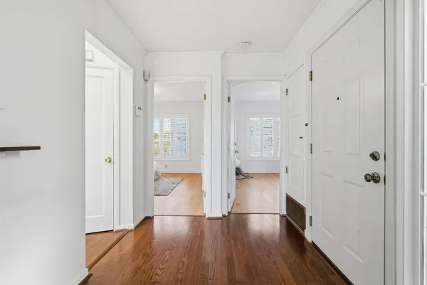 a view of a bathroom with a shower and a tub