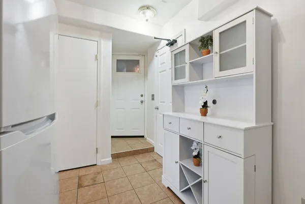 a hallway with cabinets