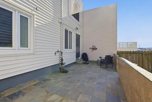 a view of a terrace with chairs