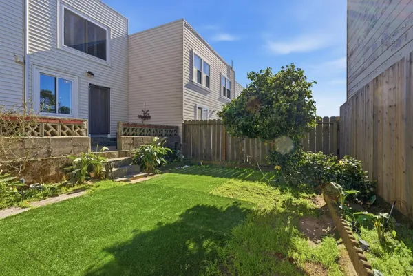 a view of front of house with a yard