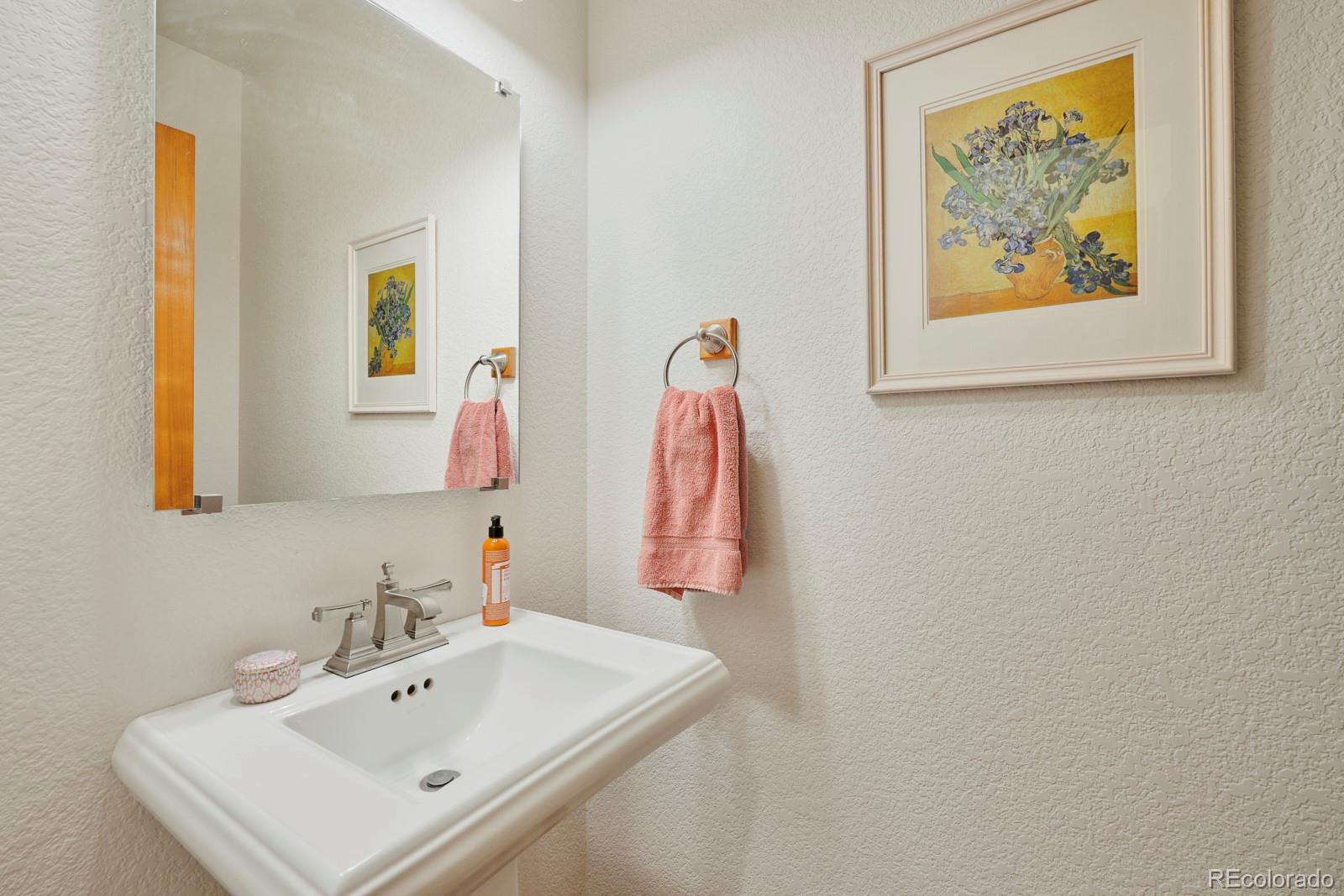 3589 Ridge Road Nederland, CO 80466 - Photo 17 of 40 a bathroom with a sink and a mirror