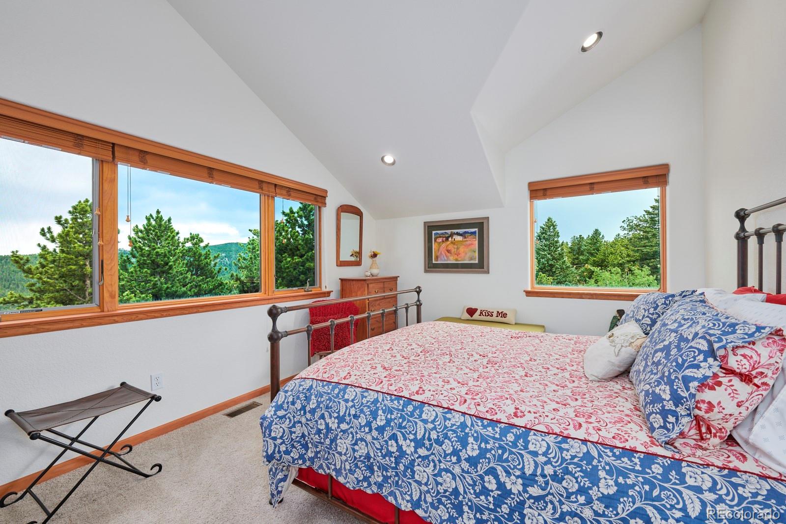3589 Ridge Road Nederland, CO 80466 - Photo 20 of 40 a living room with a large window and a table