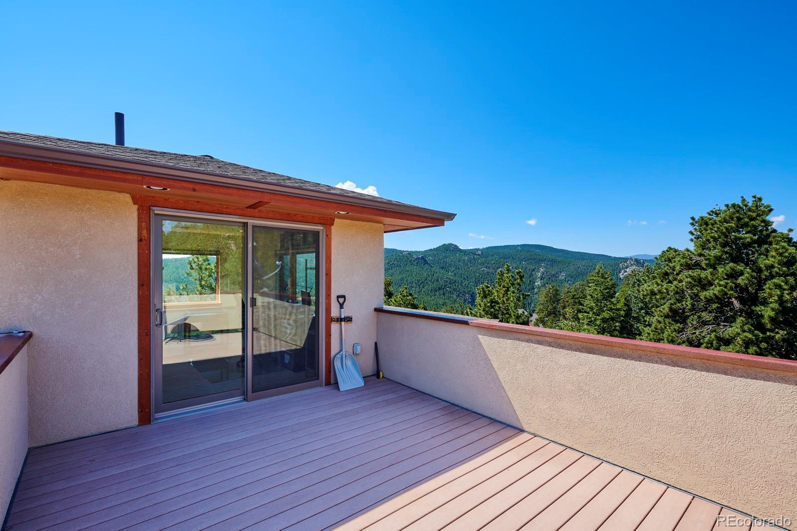 3589 Ridge Road Nederland, CO 80466 - Photo 28 of 40 a porch with seating space