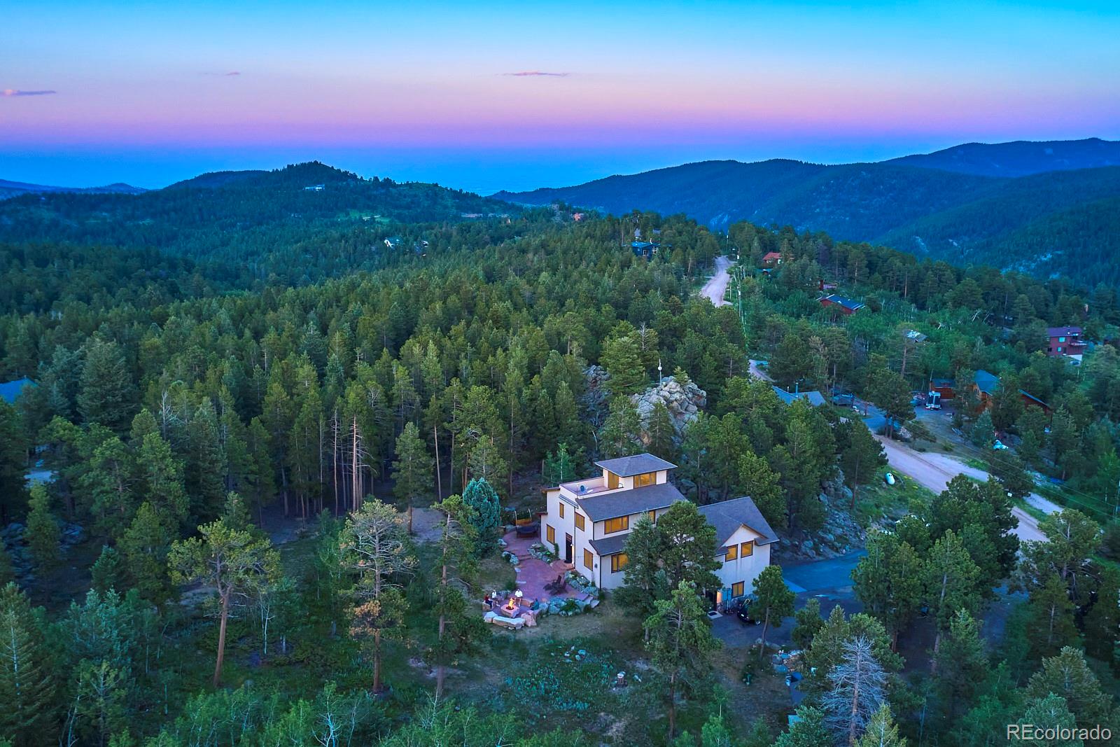 3589 Ridge Road Nederland, CO 80466 - Photo 40 of 40 a view of a city with sunset view