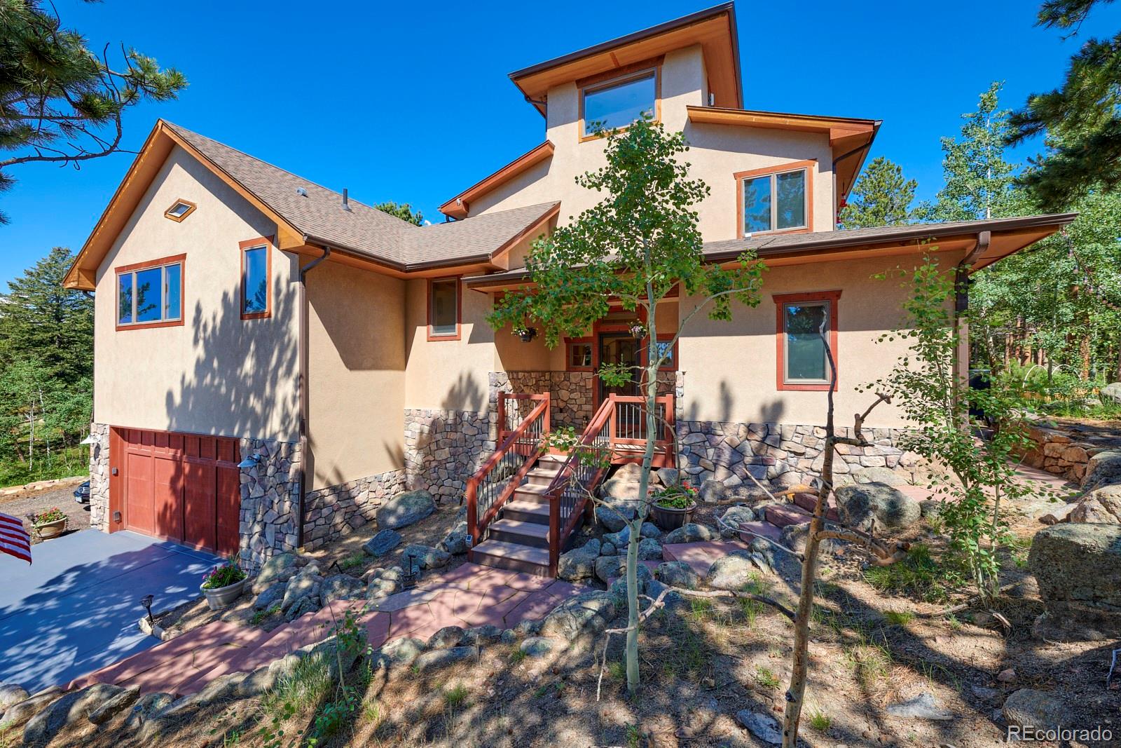 3589 Ridge Road Nederland, CO 80466 - Photo 4 of 40 a view of house with a outdoor space